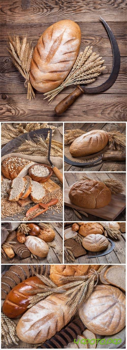 Bread and wheat on wood background stock photo